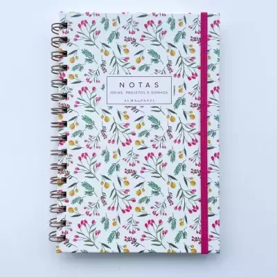 Caderno espiral com capa branca floral e texto NOTAS IDEIAS, PROJETOS E SONHOS ALMA em PAPEL