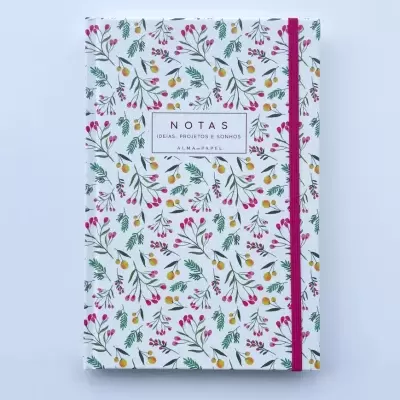 Caderno com capa branca floral e elástico rosa