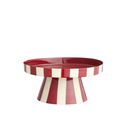 Mesa auxiliar vermelha e branca às riscas com topo circular.