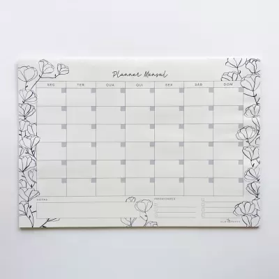 Planner mensal em papel branco com desenho de flores a preto e calendário semanal