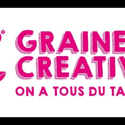 Logótipo GRAINE CREATIVE com texto rosa e símbolo de flor em forma de coração