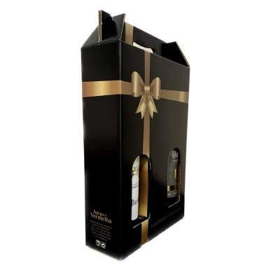 embalagem preta para duas garrafas com fita dourada e laço