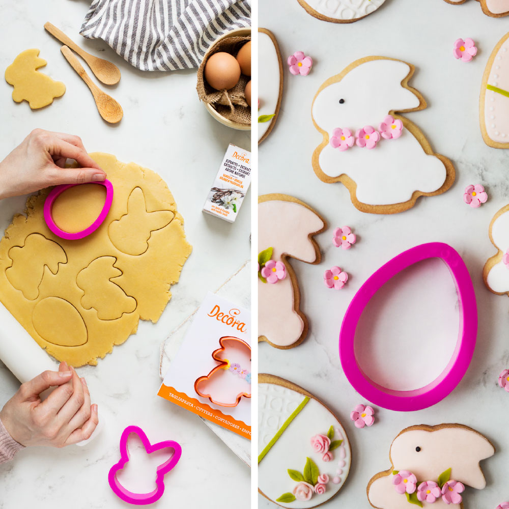 Cortadores de biscoito em forma de coelho e ovo cor-de-rosa com bolachas decoradas temáticas de Páscoa