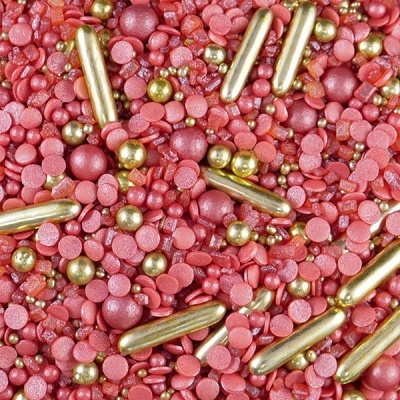 Açúcar decorativo rosa e dourado para bolos com diferentes formas e texturas