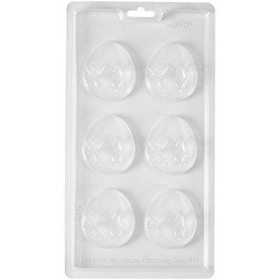 Molde transparente com seis cavidades em forma de ovos de Páscoa com desenhos de coroa