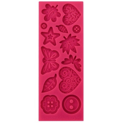 Forma de silicone rosa com moldes variados para decoração