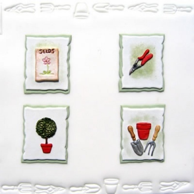 Azulejos decorativos com imagens de sementes, podador, planta e ferramentas de jardim.