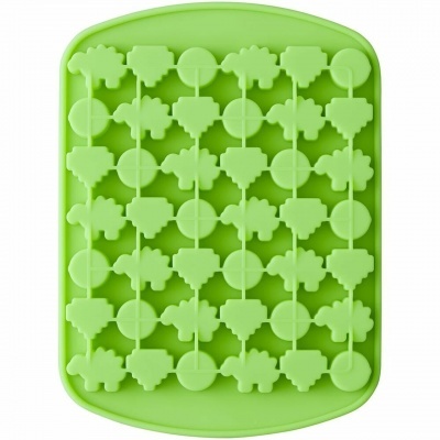 Forma de silicone verde com formas de árvores e círculos