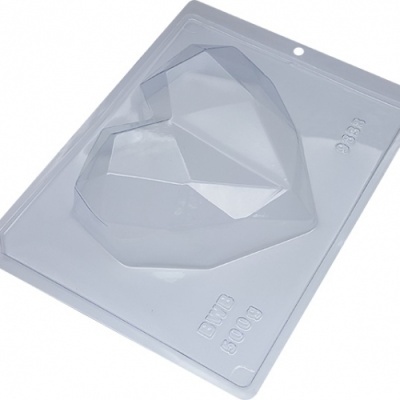 Forma plástica translúcida para chocolate em forma de coração facetado