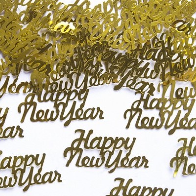 Confetes dourados de acrílico com texto 'Happy New Year' em superfície branca