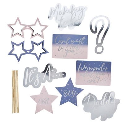 Adereços para festa de género com estrelas e frases em azul, rosa e prateado