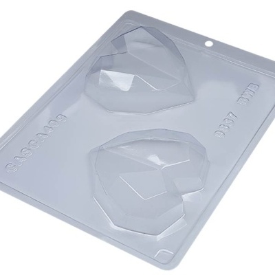 Molde plástico transparente com duas formas de coração facetado
