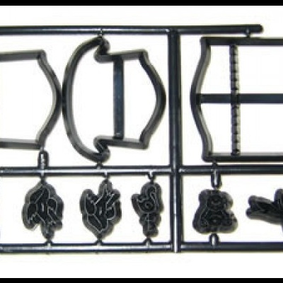 Peças pretas destacáveis em suporte plástico para montagem