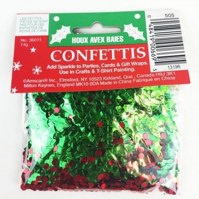 Pacote de confetis verdes e vermelhos com etiquetas vermelhas e texto em inglês e francês