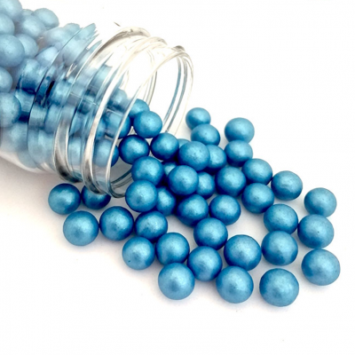 Frasco com pérolas azuis brilhantes