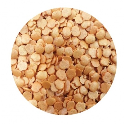 Confetis metálicos dourados pequenos em forma de círculos e flores, textura brilhante