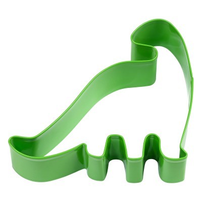 Formador de massa verde em forma de dinossauro sobre fundo branco