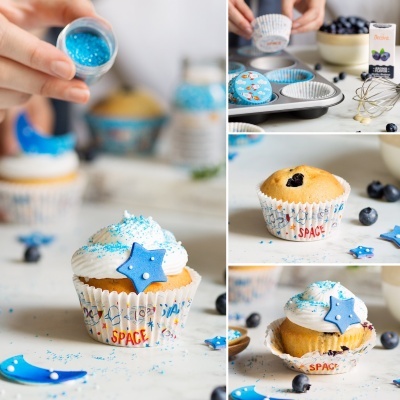 Cupcake decorado com tema espacial e ingredientes para confeitaria