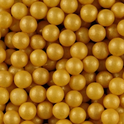Esferas pequenas douradas com brilho perolado