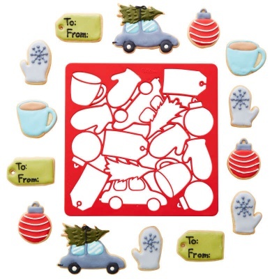 Biscoitos de Natal decorativos e stencil vermelho para bolos