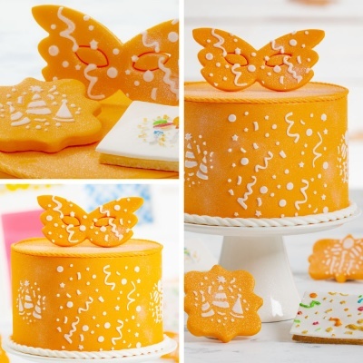 Bolo laranja decorado com complemento borboleta laranja e biscoitos decorados