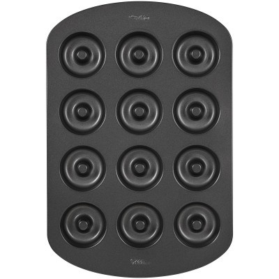 Tabuleiro preto para cozer donuts com 12 cavidades redondas