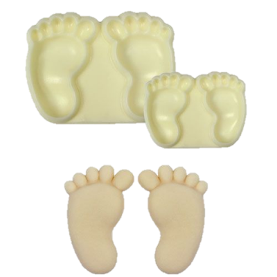 Moldes e sabões em forma de pés de bebé creme