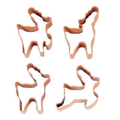 quatro cortadores de biscoitos em forma de unicórnio de metal cobre