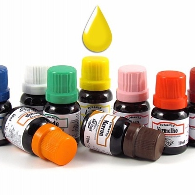 Oito frascos pequenos de tinta colorida com tampas correspondentes e conta-gotas amarelo