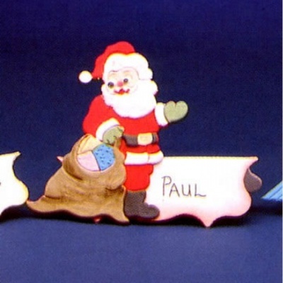Figura de Natal de madeira com Pai Natal e saco de presentes com nome PAUL