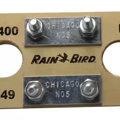 Placa de montagem amarela da RAIN BIRD com parafusos e orifícios circulares