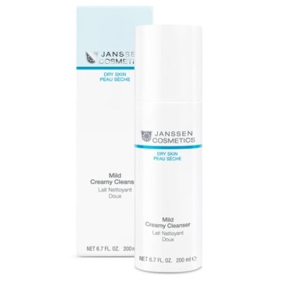 Frasco e embalagem do Janssen Cosmetics Mild Creamy Cleanser para pele seca, branco com texto azul e preto
