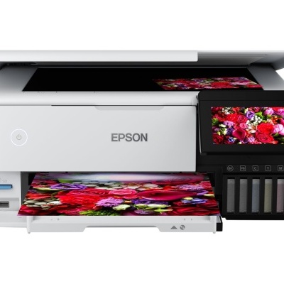Impressora Epson branca com visor digital e papel impresso com flores