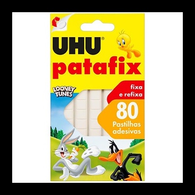 Embalagem amarela de pastilhas adesivas UHU patafix com personagens Looney Tunes