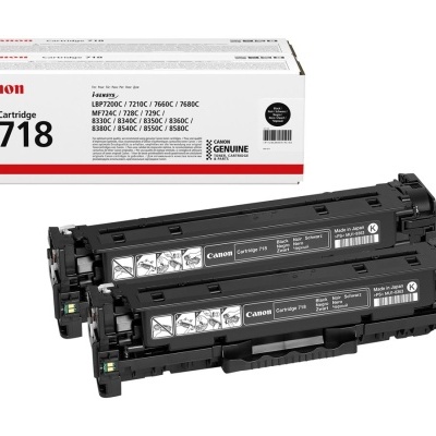 Dois toners Canon Cartridge 718 com embalagem branca ao fundo.
