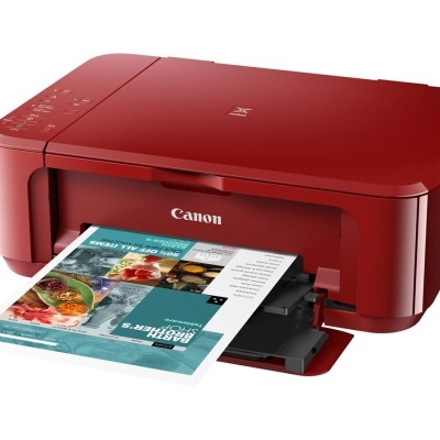 Impressora Canon vermelha a imprimir papel colorido.