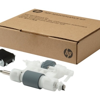 Kit de manutenção HP com peça branca e cinzenta, peça preta e caixa de cartão castanha