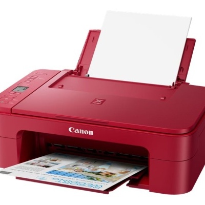 Impressora Canon vermelha a imprimir folha colorida