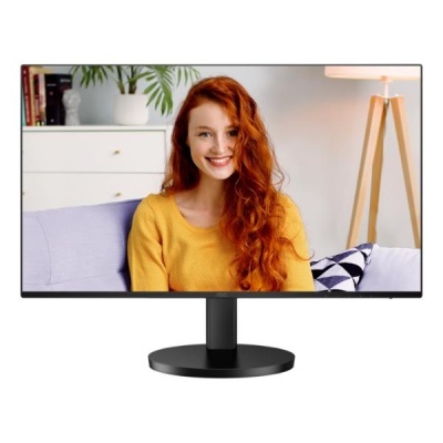 Monitor preto com imagem de mulher ruiva numa sala