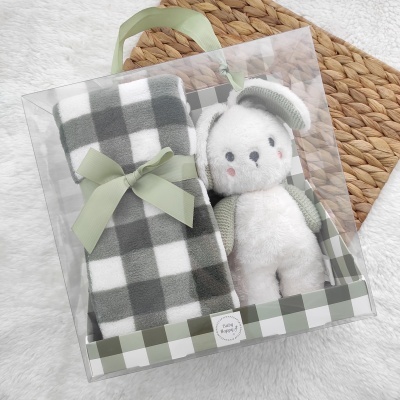 Conjunto de manta xadrez e ursinho de peluche em caixa transparente