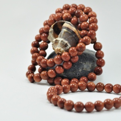 Pulseira de bolas pedra sol/ouro