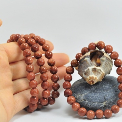 Pulseira de bolas pedra sol/ouro