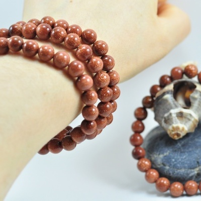 Pulseira de bolas pedra sol/ouro