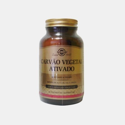 Frasco de cápsulas de carvão vegetal ativado com rótulo creme e dourado