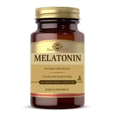 frasco castanho de suplemento alimentar Melatonin com rótulo bege