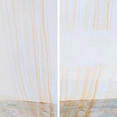 Superfície metálica branca com manchas de ferrugem e desgaste