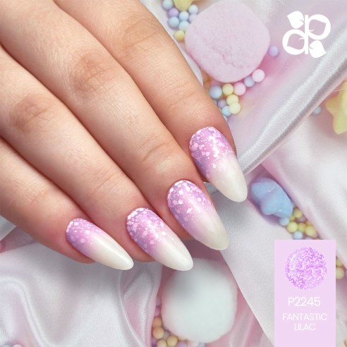 Unhas artificiais com design ombré lilás e branco com brilhos