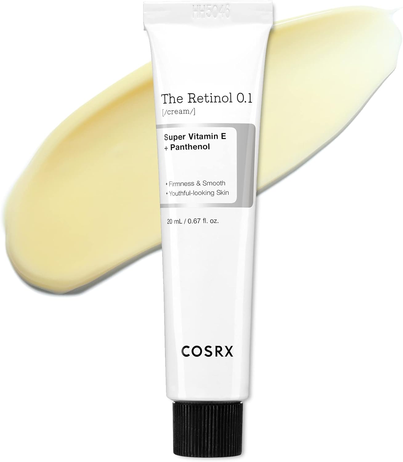 Tubo branco de creme The Retinol 0.1 da COSRX com creme amarelo-bege ao fundo