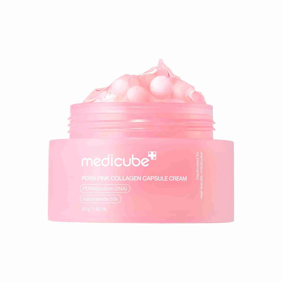 Frasco rosa de creme com cápsulas rosas no topo da marca medicube