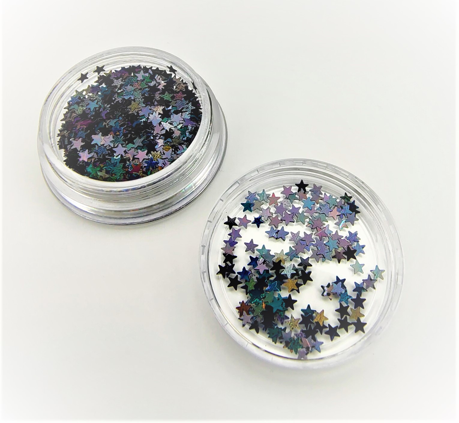 Caixas transparentes com glitter de estrelas coloridas